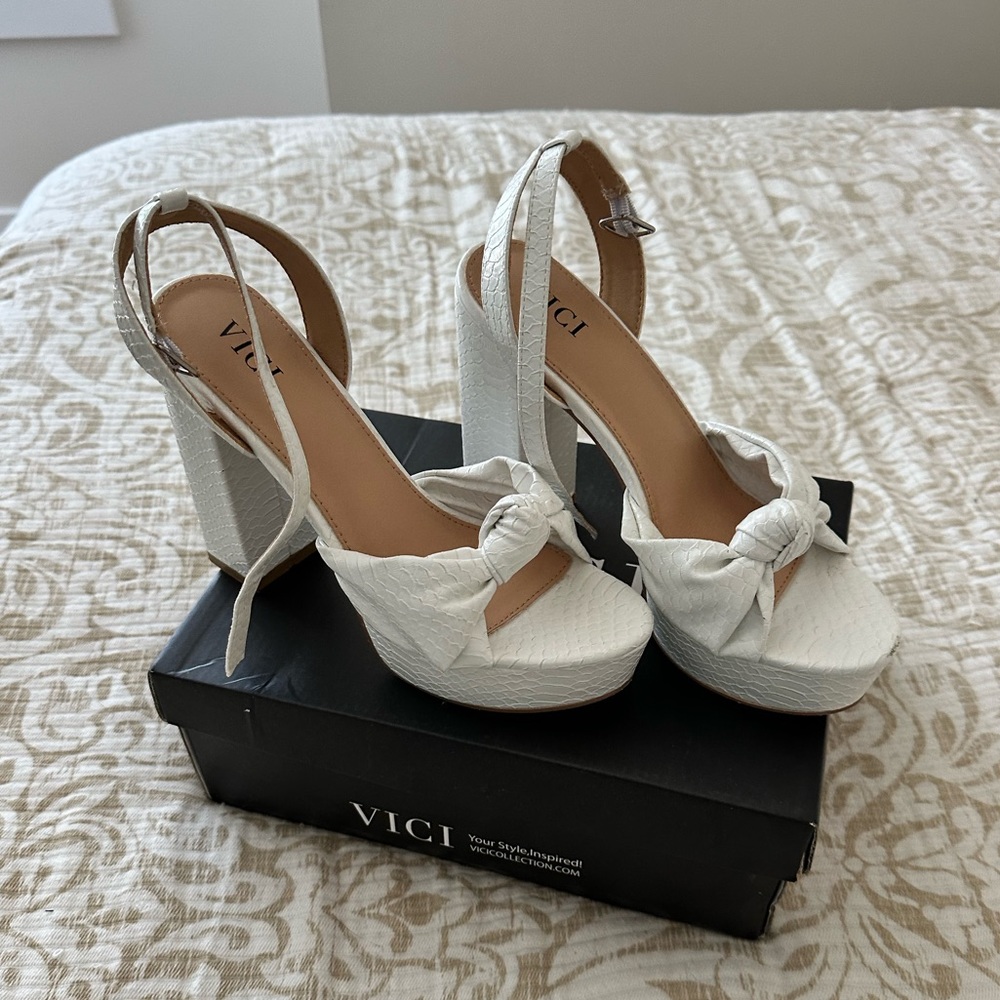 Worn once! White snake skin platform heels size 7.5